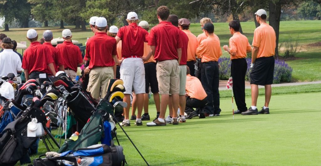 Two golf teams playing in a golf tournament